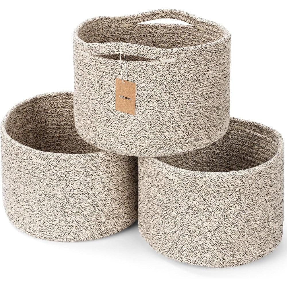 Maxuni small cotton rope storage baskets front view arranged on a wooden closet shelf holding daily home essentials