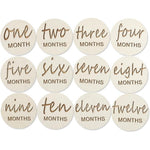 Vichona wooden baby monthly milestone cards twelve piece set front view showing elegant laser engraved script