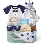 Golray baby boy gift set inside a decorative patterned suitcase showing all nine newborn essentials