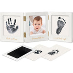 KeaBabies inkless baby handprint and footprint kit front view displaying white and gold wooden tri-fold picture frame.