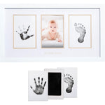Pearhead baby hand and footprint keepsake frame front view on nursery wall