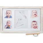 Little Hippo baby footprint kit front view showcasing rustic white frame and dual clay impressions.
