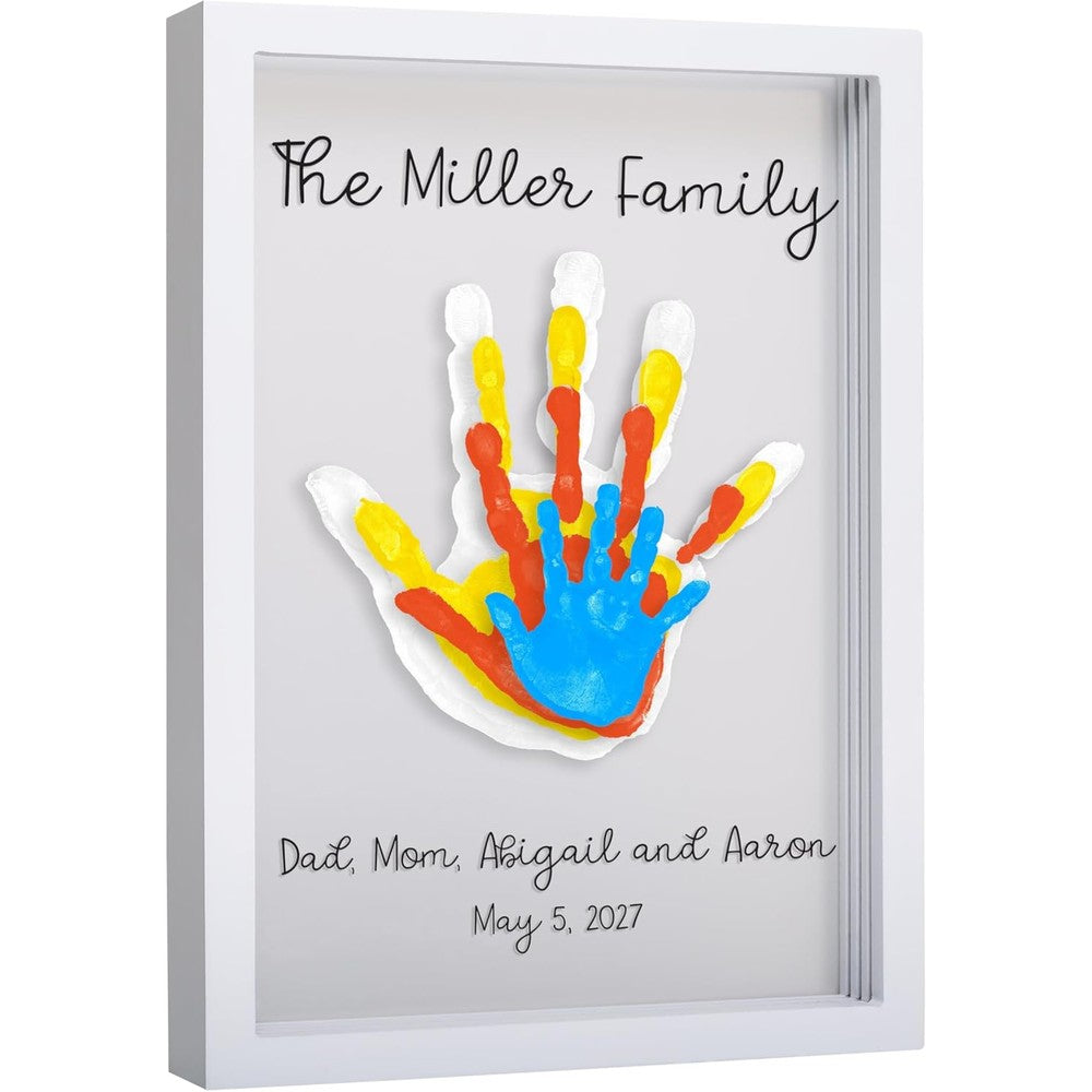 Pearhead Clear Family Handprint Frame front view showcasing the white wooden floating frame with layered colorful handprints.