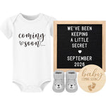 Blinking Stars pregnancy announcement box gift set front view with cotton onesie and letter board
