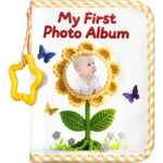 Amzoya baby soft cloth photo album front view showing the white cover and crocheted sunflower design.
