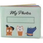 Fanna Baby soft cloth photo album front view showing light green cover with cartoon cat and dog patterns