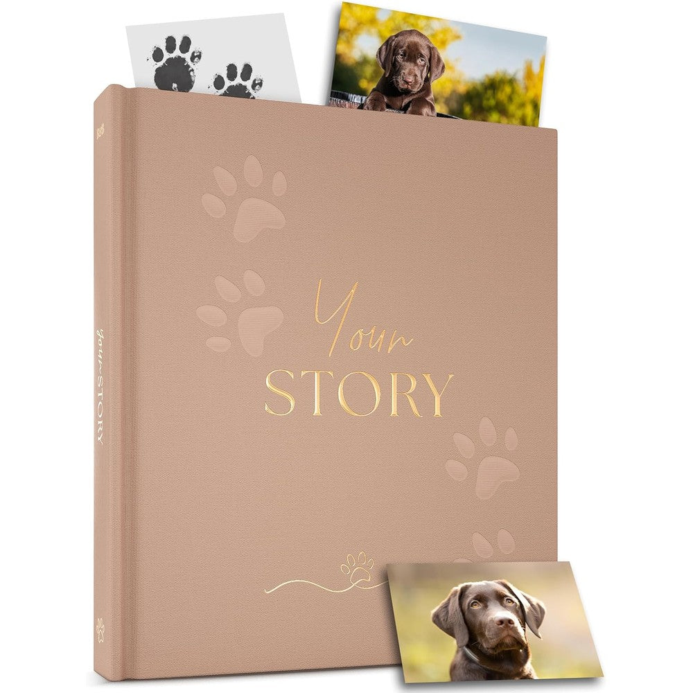 Bibi And Beau dog memory book front view showing taupe linen cover with gold lettering and embossed paw prints.