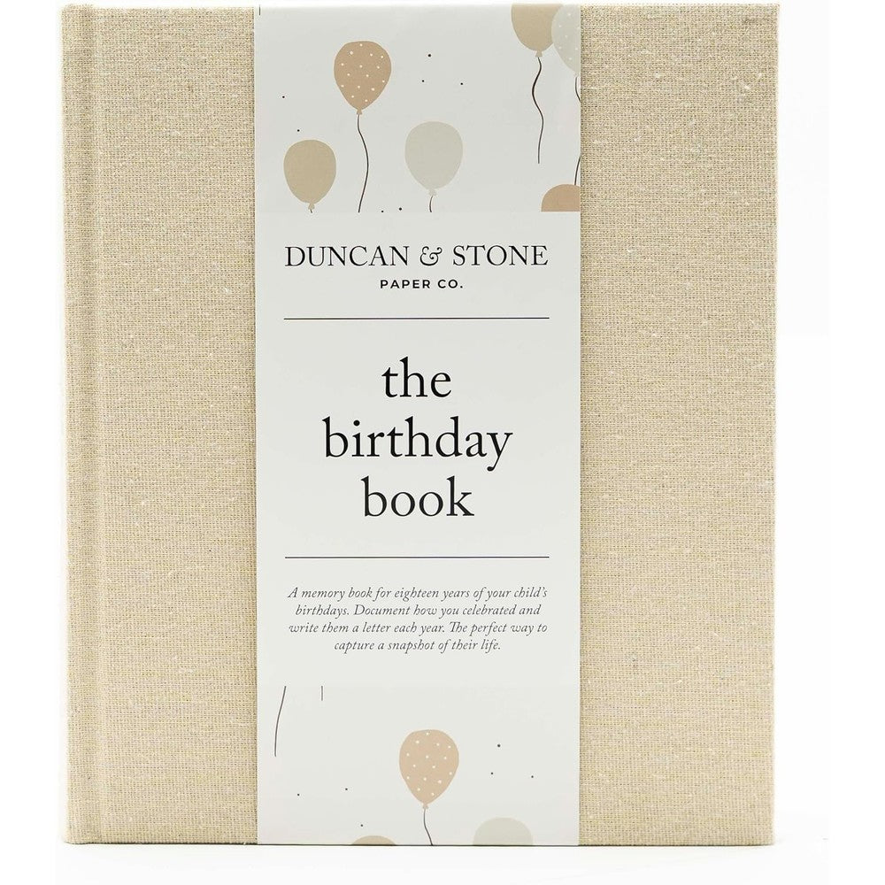 Duncan and Stone Paper Co Birthday Memory Book front view showing elegant linen cover with gold foil accents.