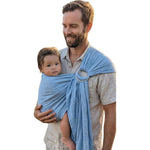 LilymoonBaby Organic Baby Ring Sling Carrier front view featuring the Azure Sky boho hemp wrap design on a parent.