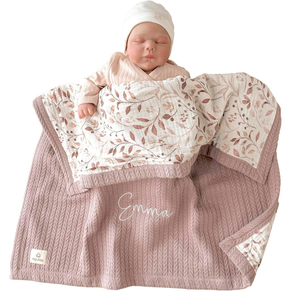 Mouliss personalized baby blanket with name front view showing custom embroidery on pink waffle fabric.