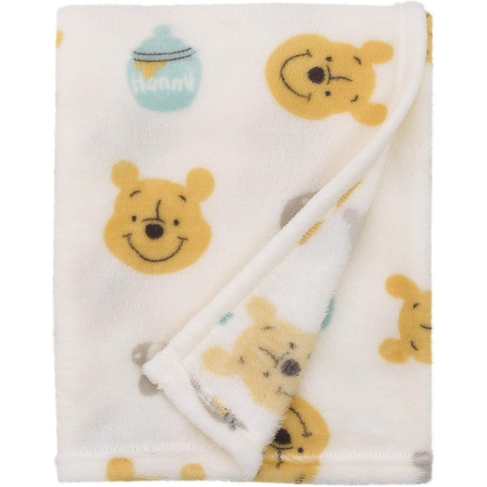Disney Winnie the Pooh super soft plush baby blanket front view showing ivory yellow and aqua allover print