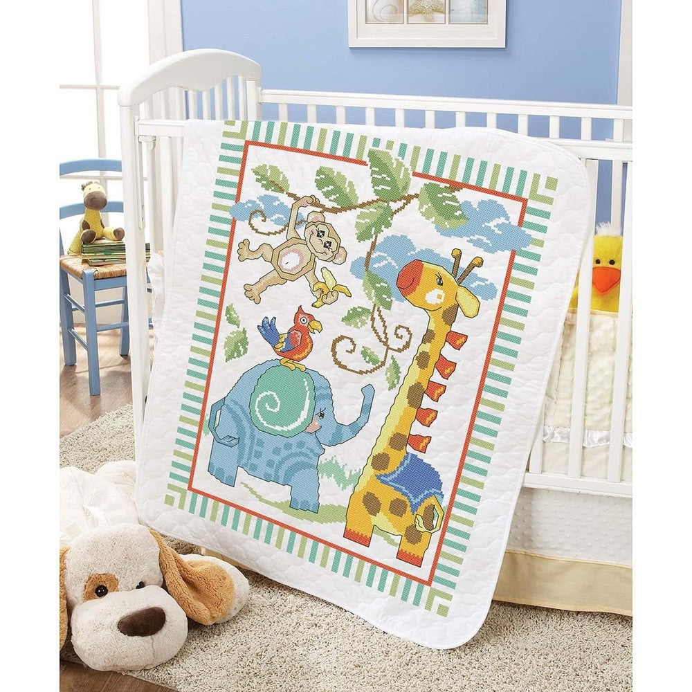 Herrschners Baby Safari Buddies Value Baby Quilt front view showing stamped cross stitch animal patterns