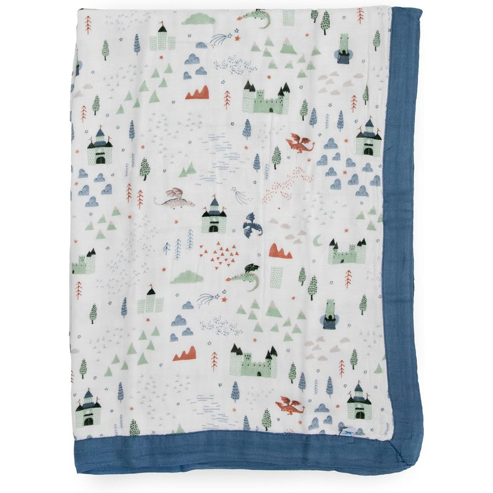 Little Unicorn Deluxe Muslin Quilt in Dragon Days print front view showing the castle design.