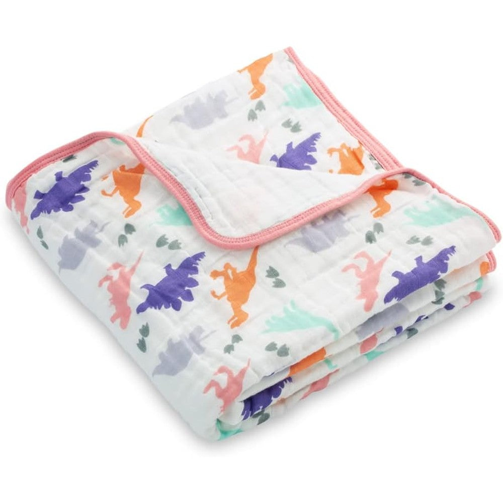 LollyBanks Muslin Baby Quilt front view showing the full dinosaur print and pink stitched edging