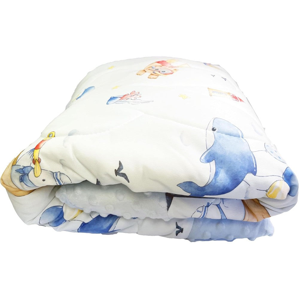 Cutie Pumpkin Baby Toddler Comforter front view featuring the blue cartoon underwater design layout in a white wooden nursery crib.