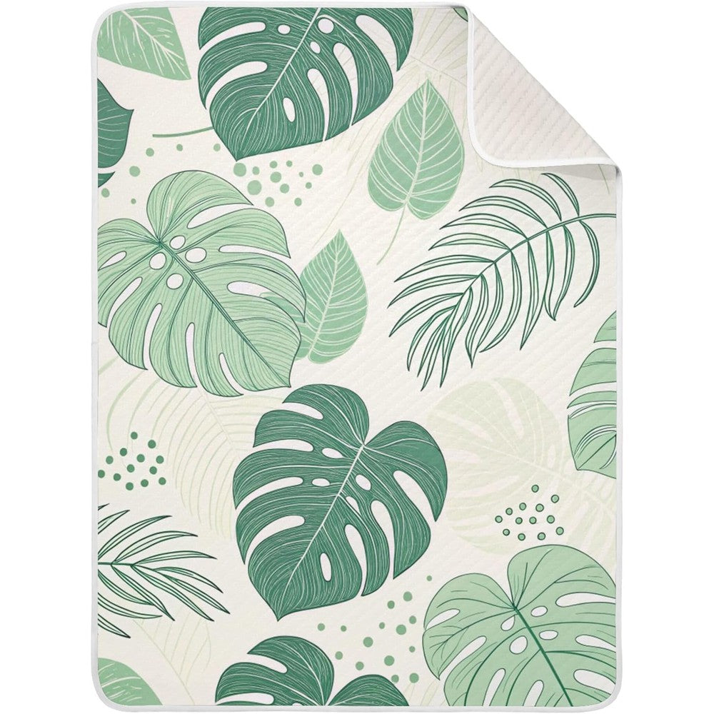 Burbuja Monstera Leaves baby blanket front view for nursery