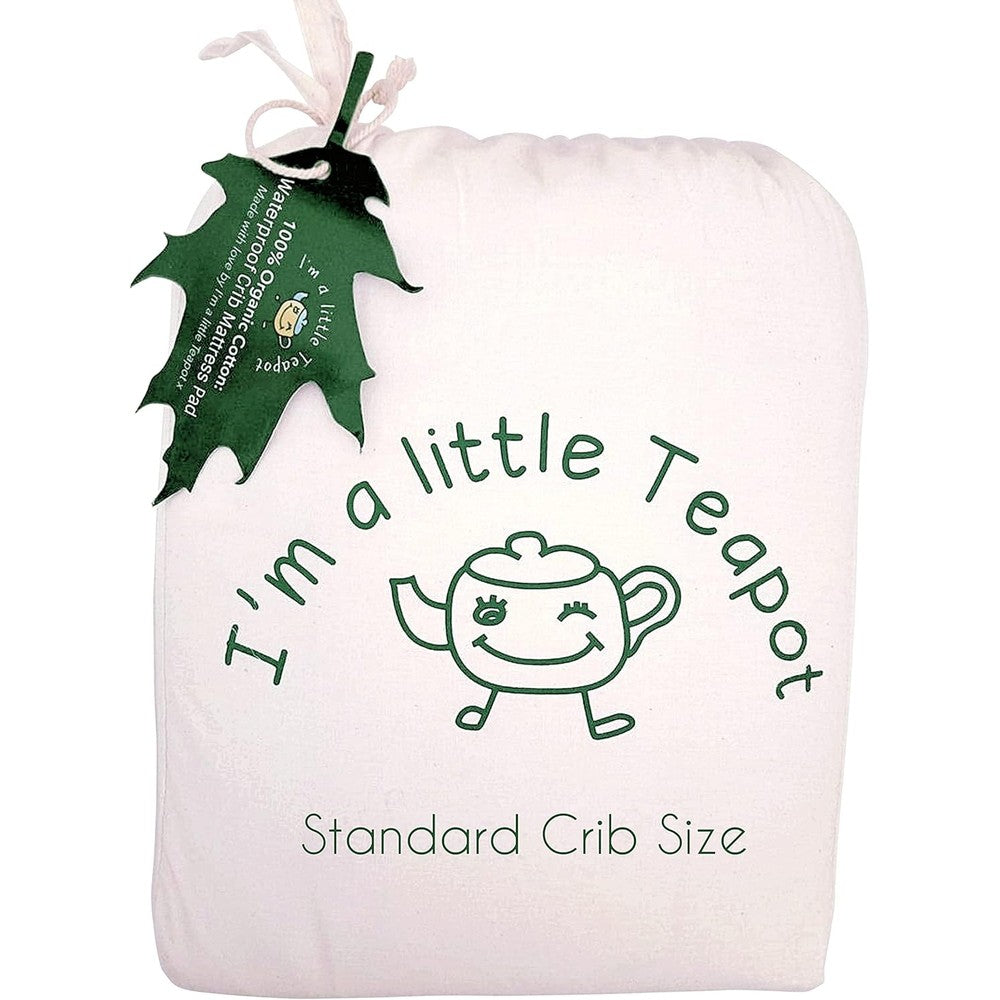 I'm A Little Teapot organic cotton crib mattress pad front view showcasing the quilted design on a standard baby crib.