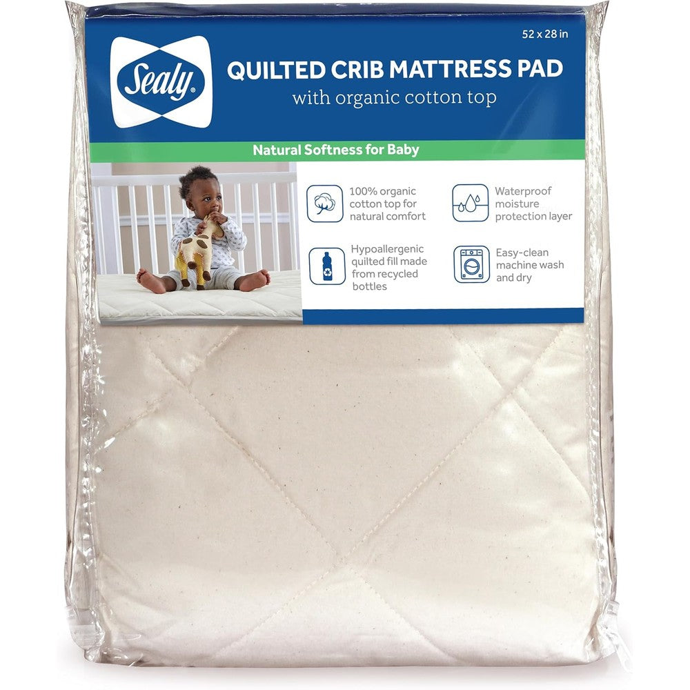 Sealy Baby Quilted Organic Cotton Fitted Crib Mattress Pad front view showing the textured cream surface.