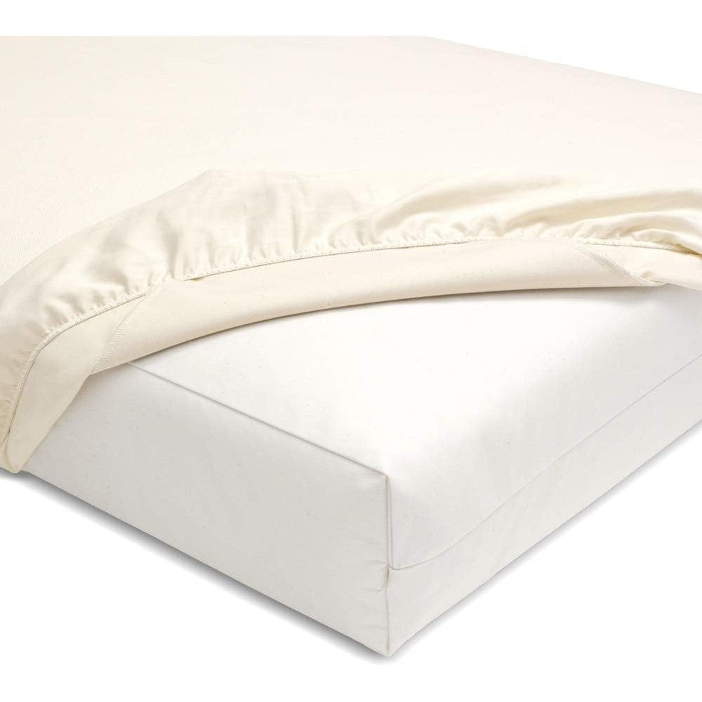 Naturepedic organic waterproof crib mattress pad front view on standard baby bed