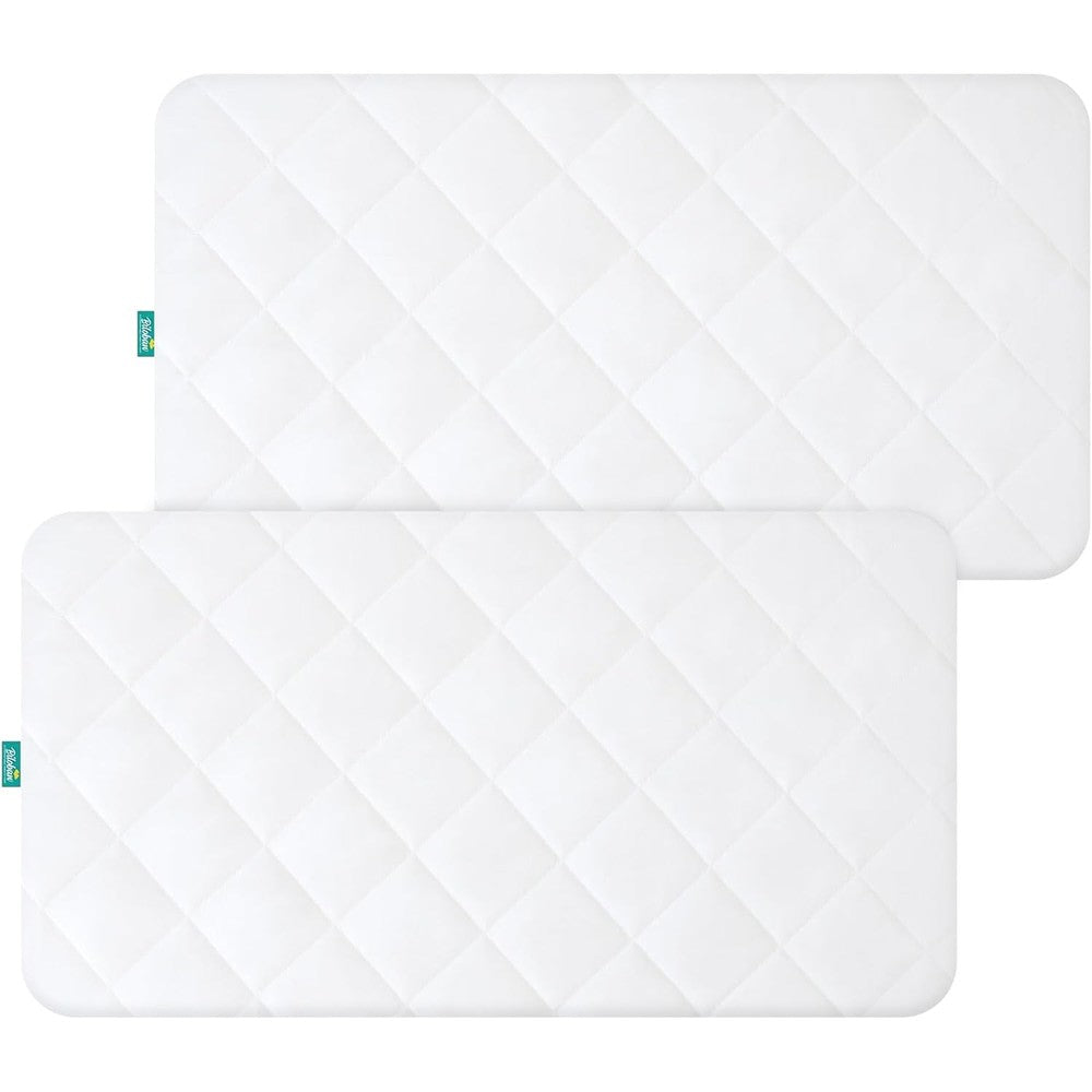 Biloban waterproof crib mattress protector front view showcasing the white quilted surface