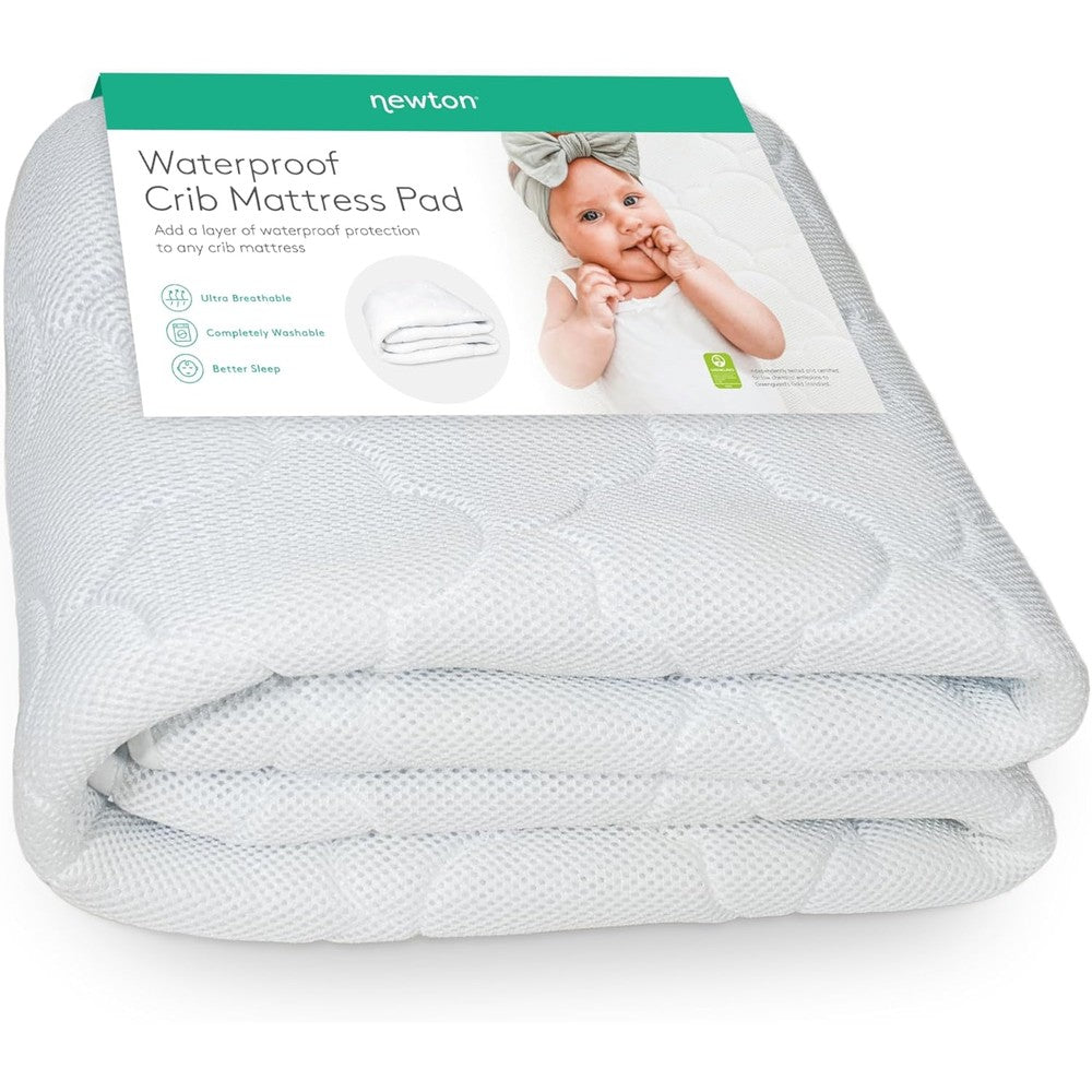 Newton Baby Waterproof Crib Mattress Pad front view on a standard nursery crib mattress.