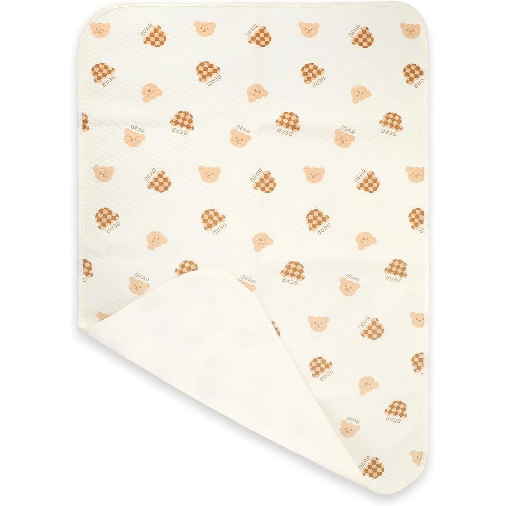 Oeofuzep waterproof crib pad front view showing the soft organic cotton stitched surface layer