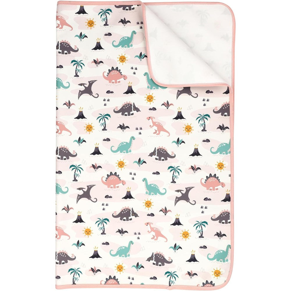 Florith reusable pee pads for kids front view showing the cartoon dinosaur pattern on a toddler bed