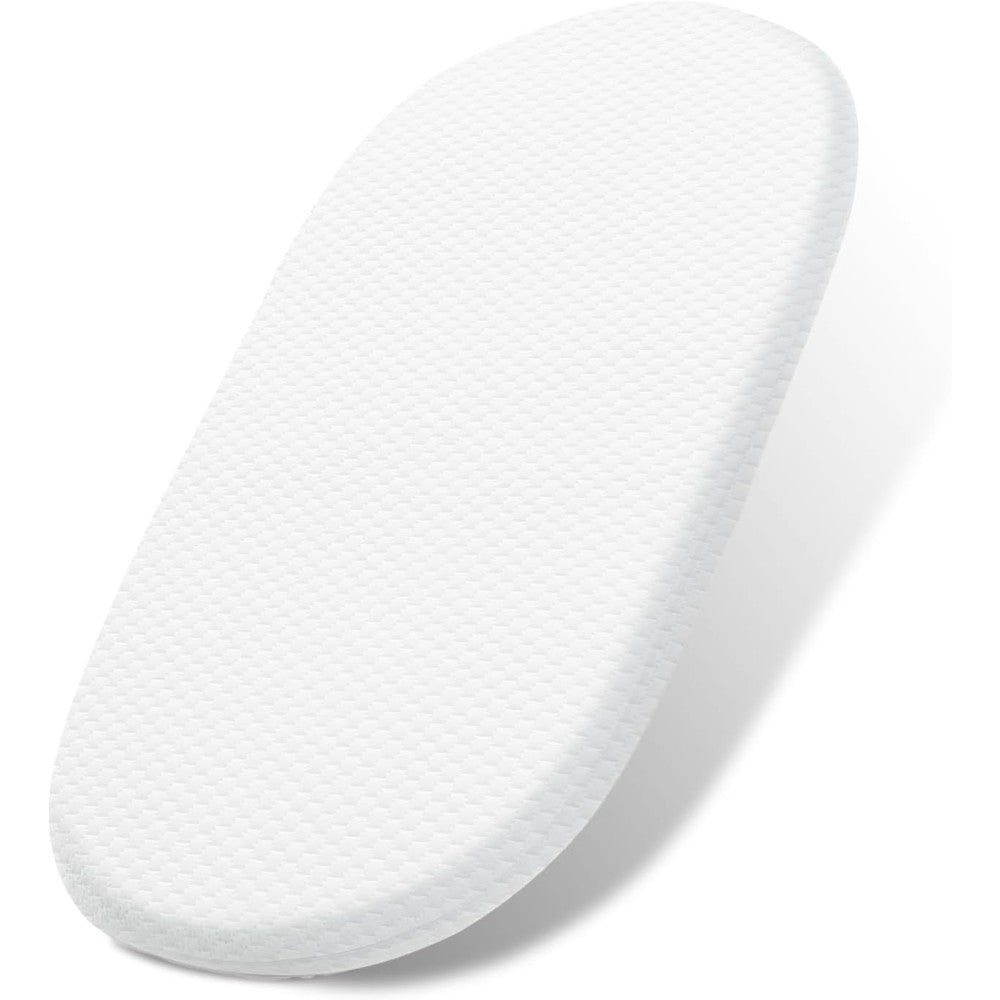 Lisara baby bassinet mattress front view showing the white oval shape and breathable cover texture.