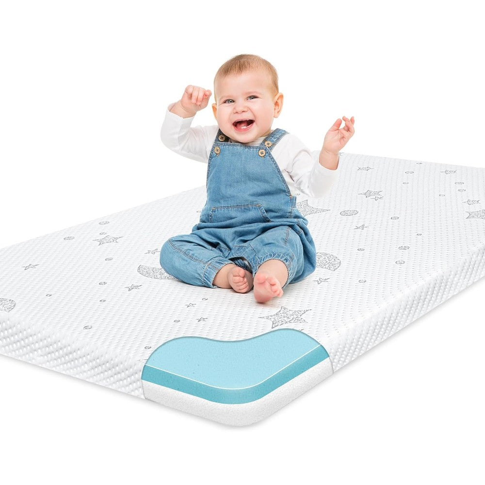 QHUCBAEG pack and play mattress front view with moon and star pattern