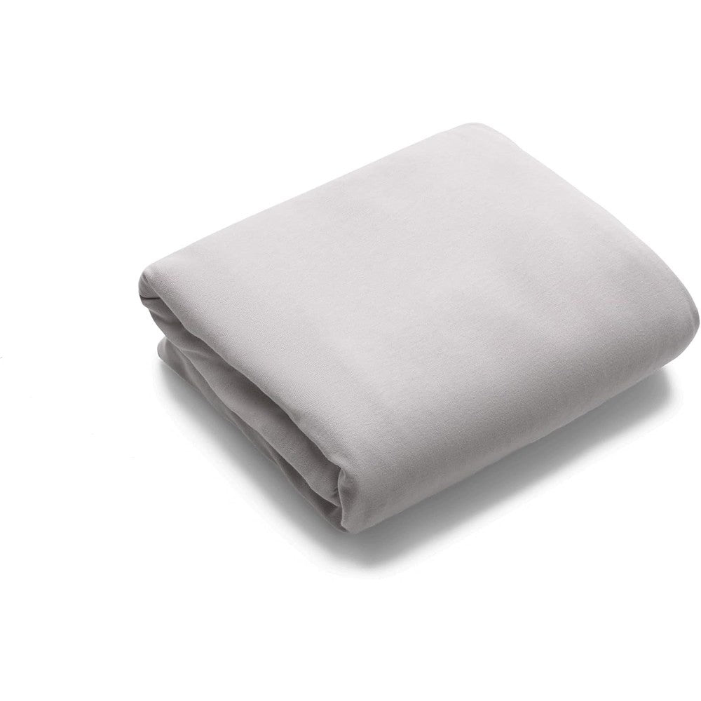Bugaboo Stardust Fitted Cotton Sheet front view showing smooth Mineral White fabric on mattress.