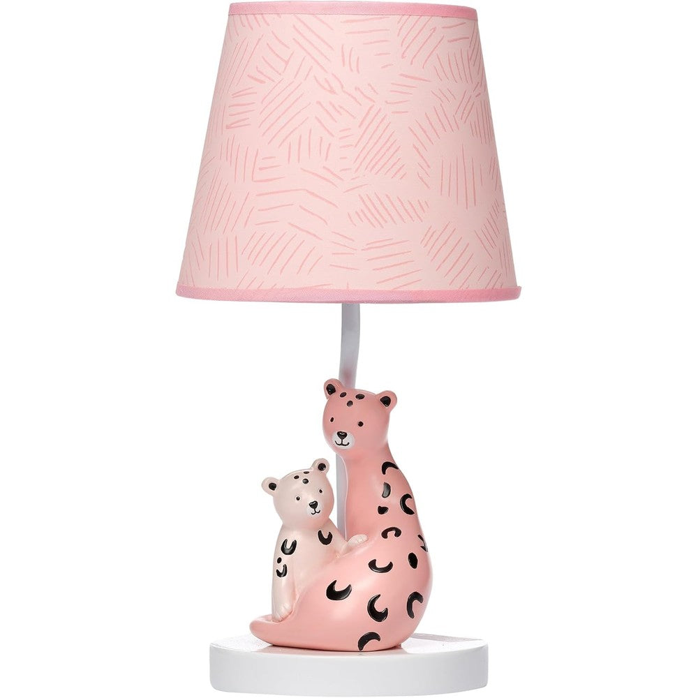 Lambs & Ivy Enchanted Safari Pink Leopard Lamp front view on a nursery table.