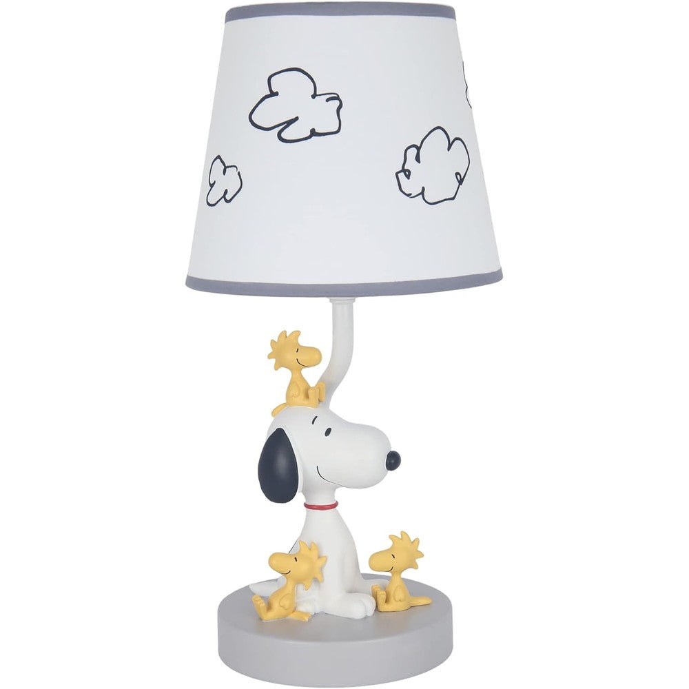 Lambs & Ivy Classic Snoopy nursery lamp front view on a nightstand