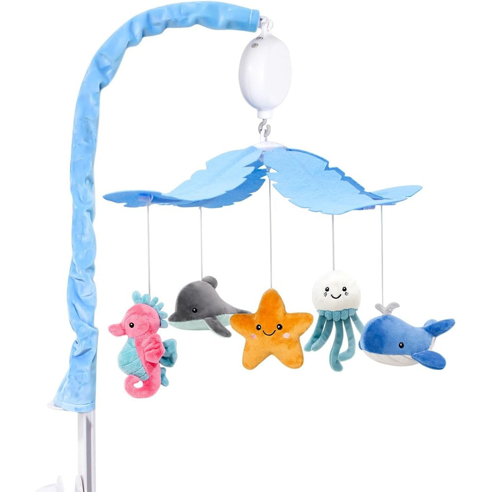 FEISIKE baby crib mobile front view showcasing the blue cloud canopy and suspended plush sea animals over an infant nursery bed.