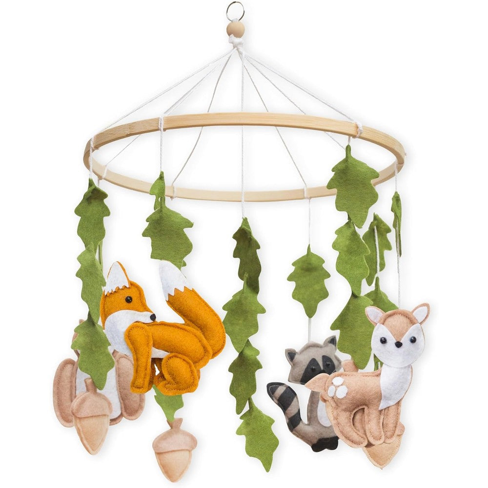 First Landings Woodland Baby Mobile front view hanging over a crib
