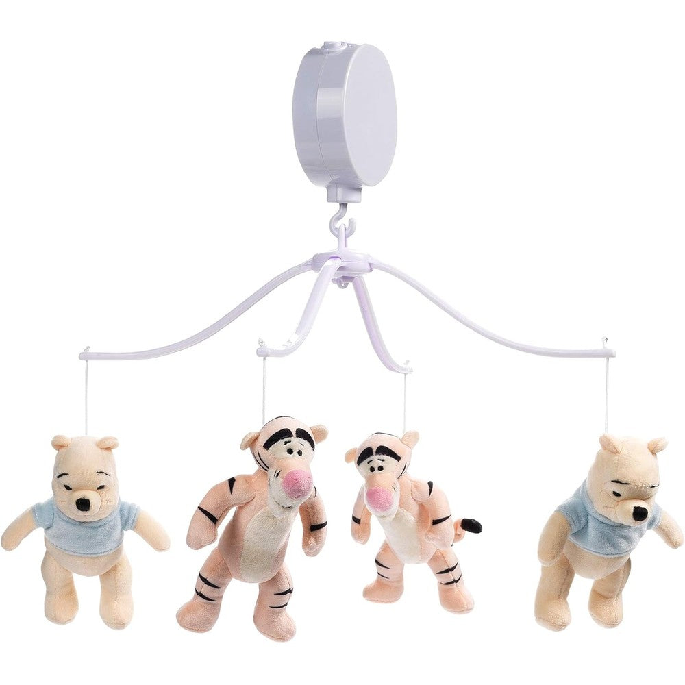 Lambs & Ivy Disney Baby Winnie the Pooh Hugs Musical Crib Mobile front view on a white crib