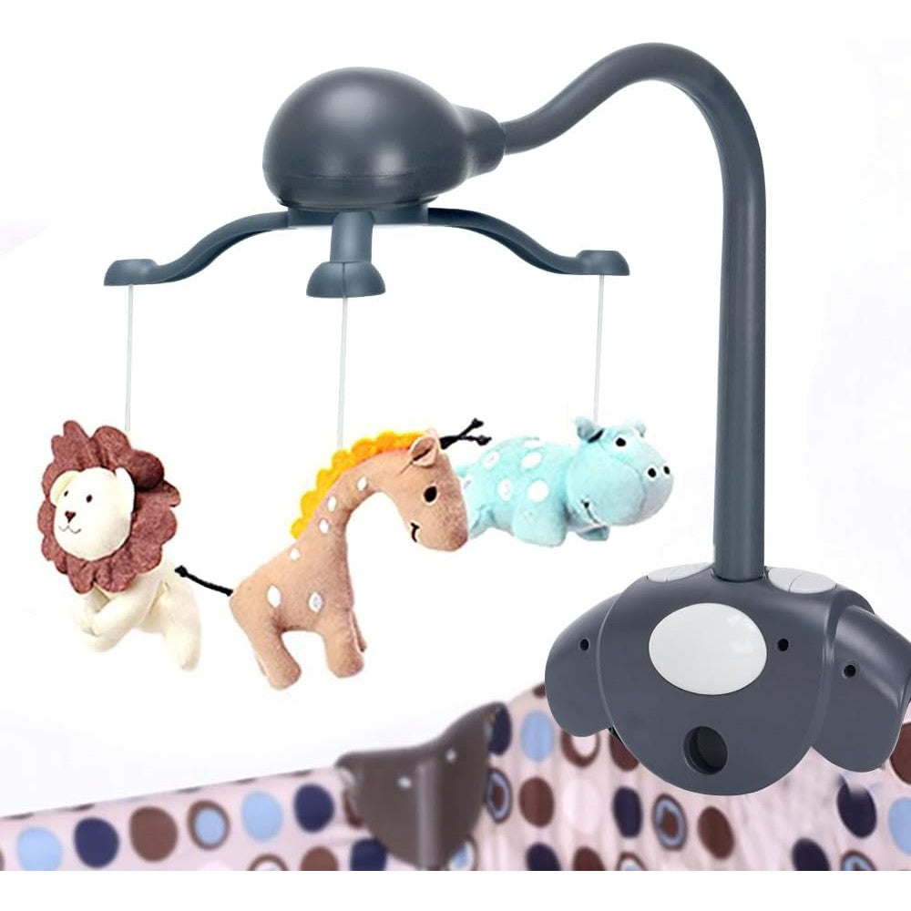 Cutie Pumpkin iHomes baby crib mobile front view attached to a white wooden nursery cot showing the colorful hanging elements