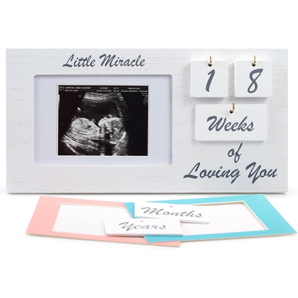 YelloIris white ultrasound sonogram picture frame front view on a nursery table