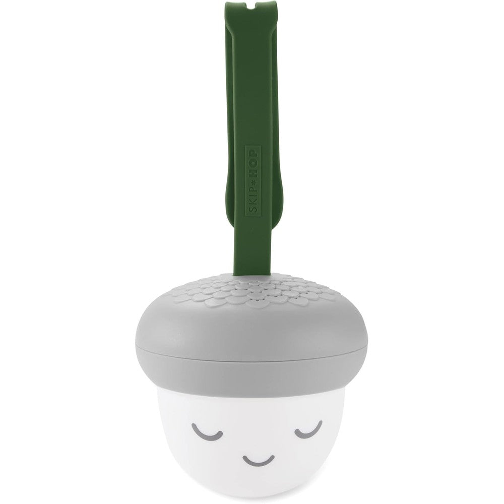 Skip Hop Glow With Me Portable Acorn Baby Sleep Sound Machine front view showing gray silicone cap and green strap