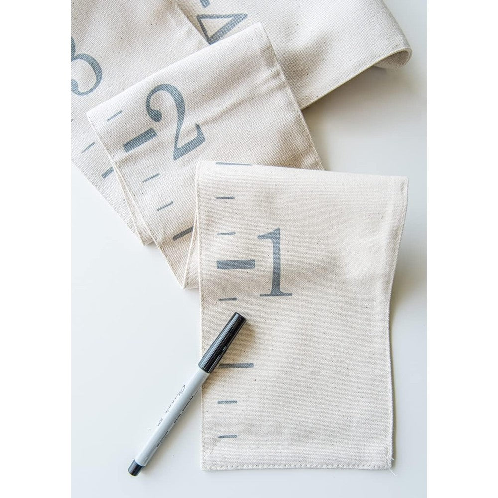 White Loft canvas growth chart ruler front view displayed on a neutral nursery wall.