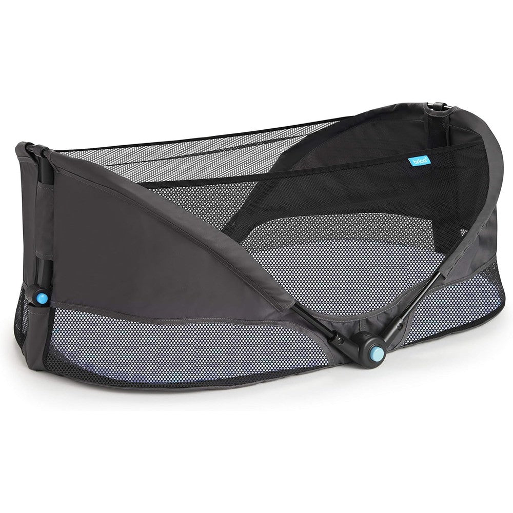 Munchkin Brica Fold N Go Travel Bassinet front view unfolded on a flat surface