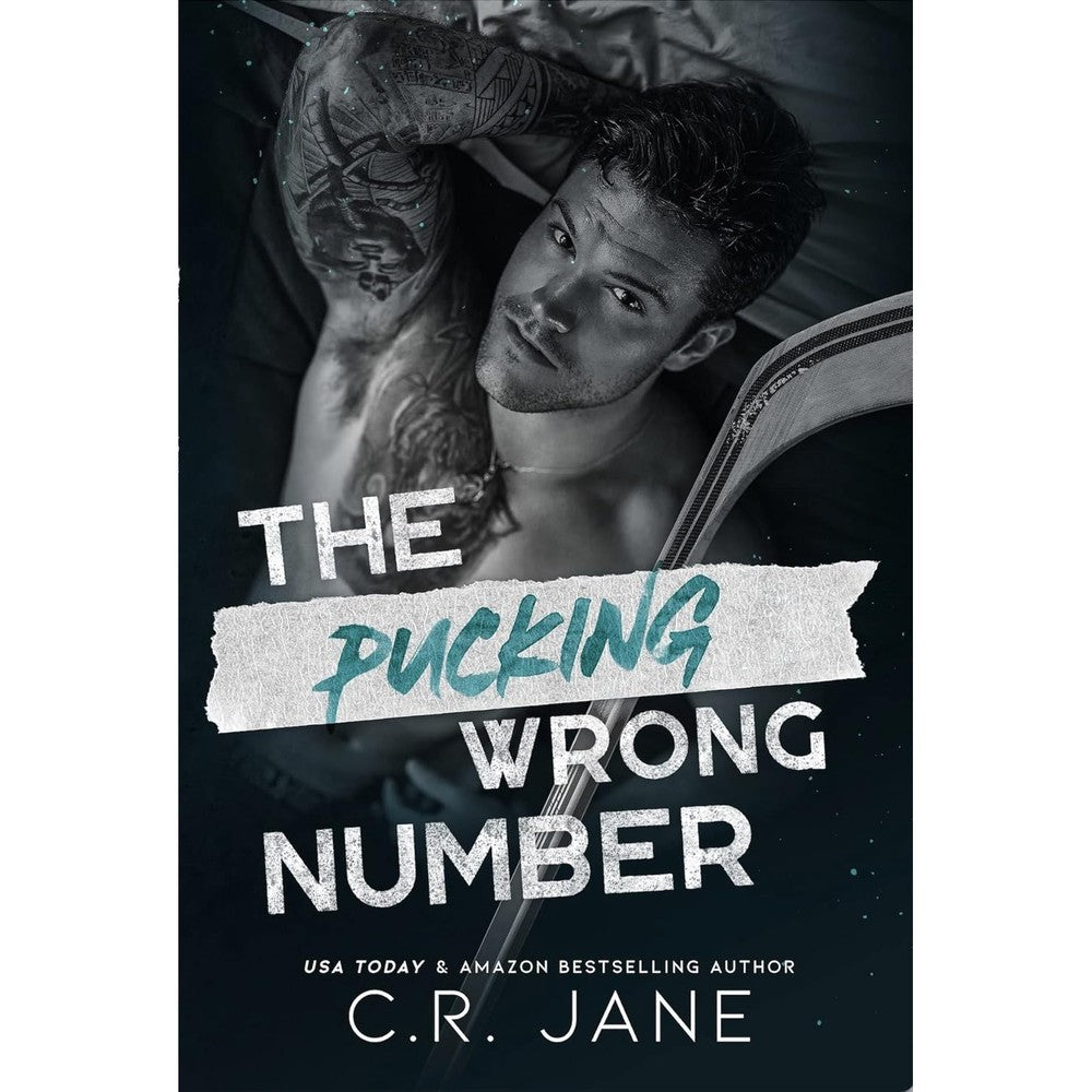 The Pucking Wrong Number: A Hockey Romance (The Pucking Wrong Series Book 1)