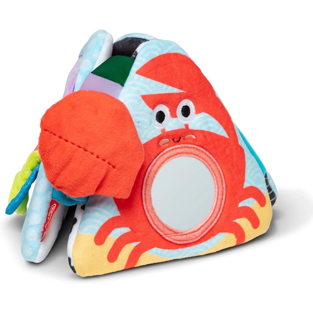Melissa & Doug Ocean Tummy Time Triangle infant toy set up in pyramid mode on a play mat