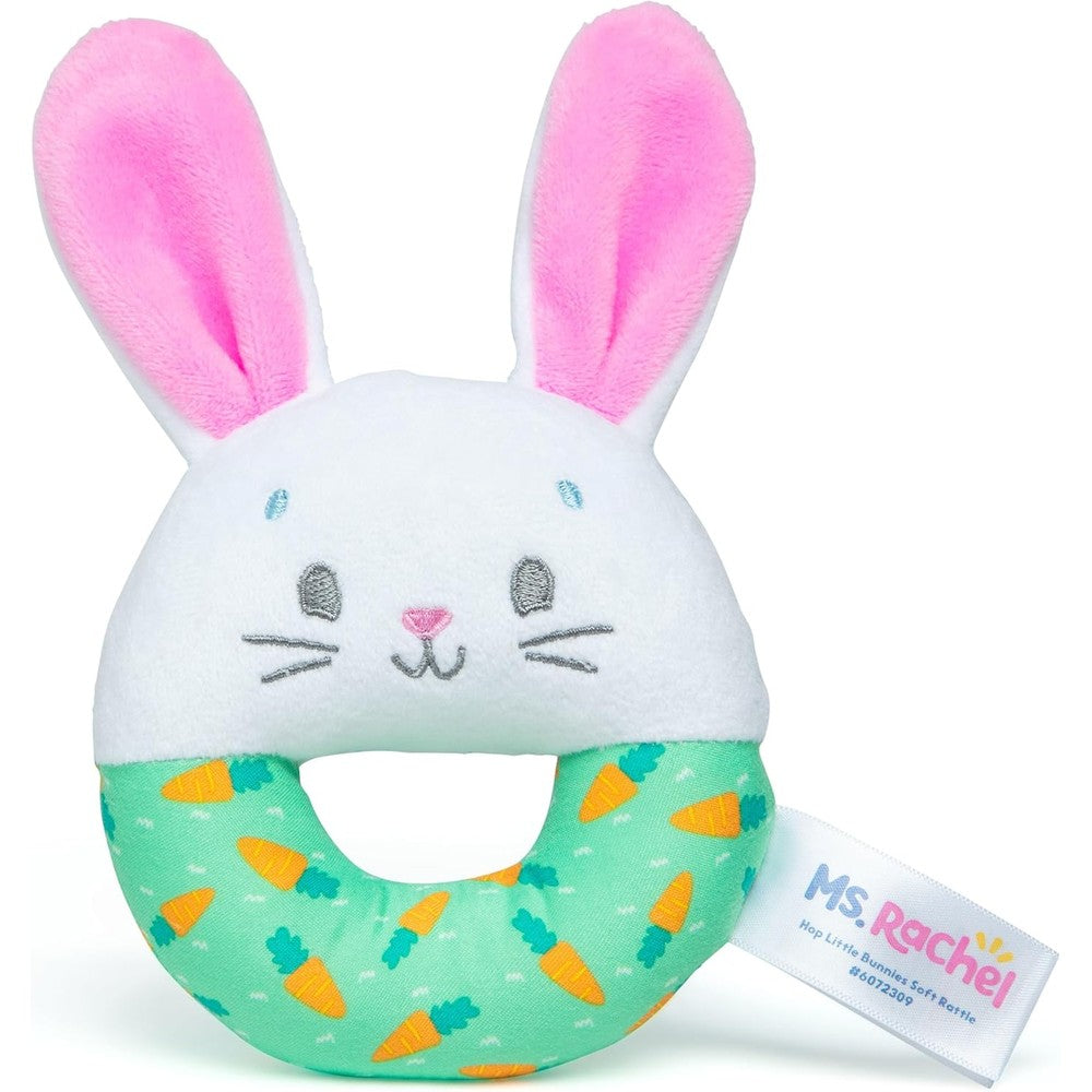 Ms. Rachel Hop Little Bunnies Soft Sensory Ring Rattle front view showing the plush bunny head and green carrot-printed ring toy.