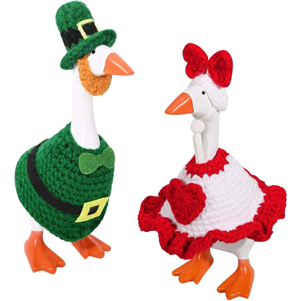 JcHrmers desk goose outfits front view showing the Valentine and St Patricks Day mini sweaters on figurines.