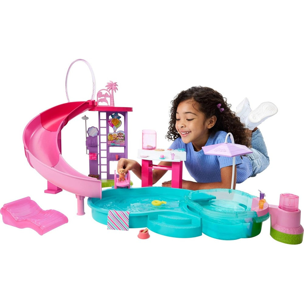 Barbie Dream Pool Playset front view showcasing the large pink slide and bubbling hot tub setup.