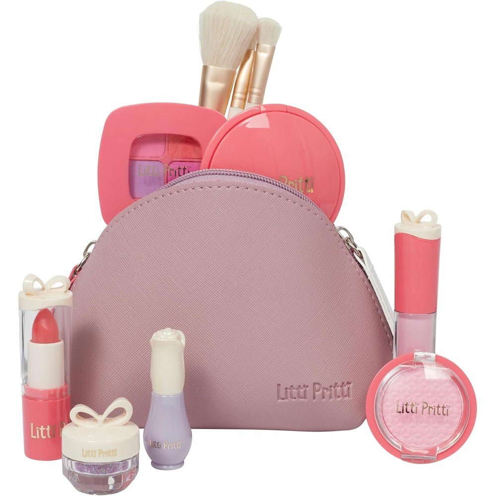 Litti Pritti Toddler Pretend Makeup Kit front view with eleven play cosmetic pieces spread out next to the pink bag