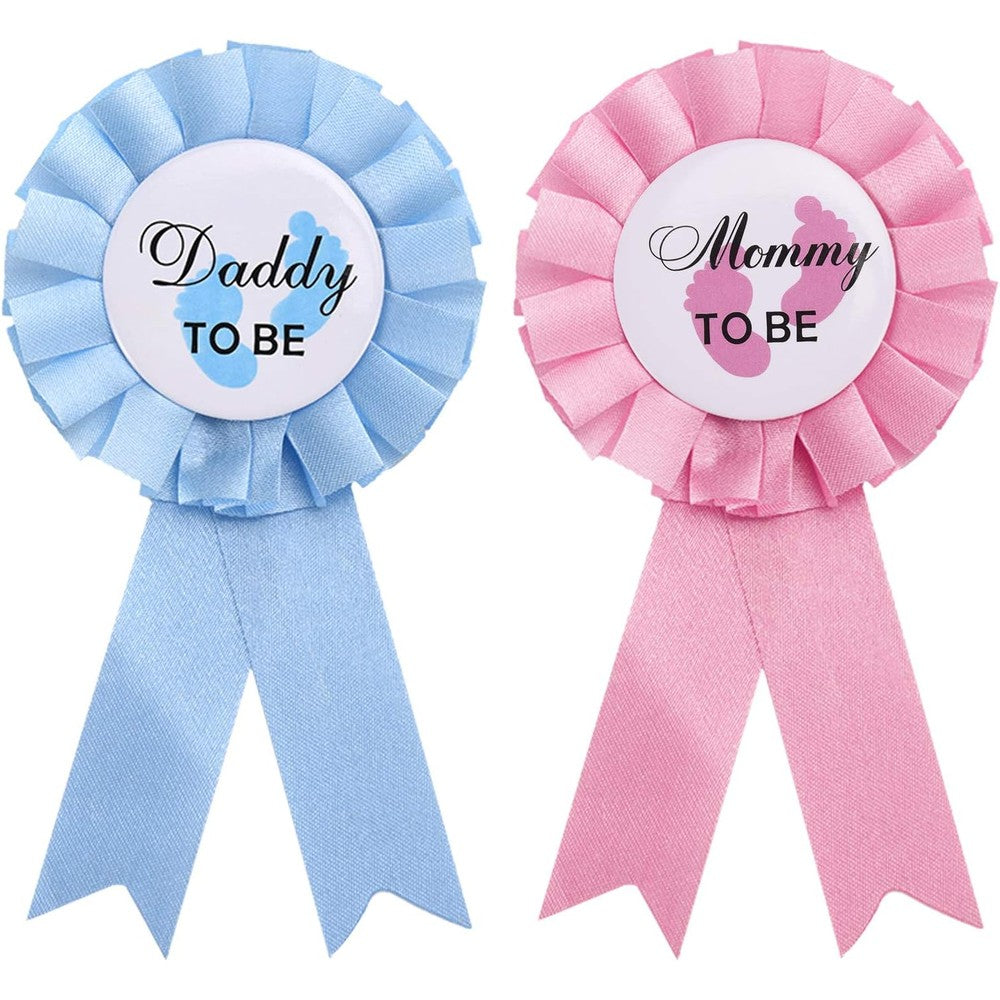 WILLBOND Daddy and Mommy to Be tinplate badge pin set front view showing pink and blue ribbons.