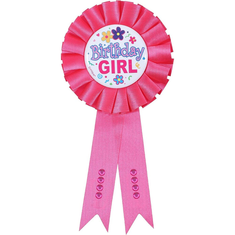 Zyghjort birthday girl pin front view showing pink satin rosette and pleated ribbon tails