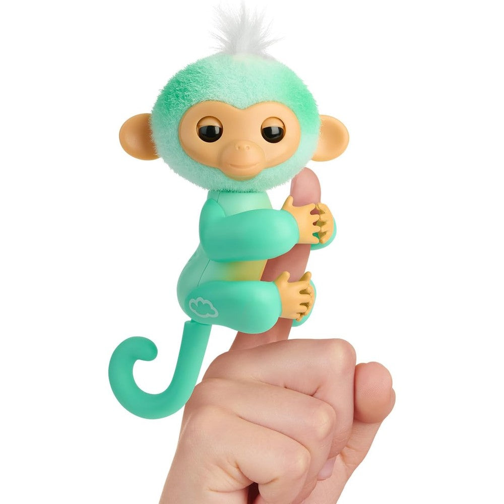 Fingerlings interactive baby monkey Ava teal front view interactive toy