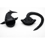 Generic Bloop versus El Gran Maja sea creature toys front view showing matte black articulated bodies